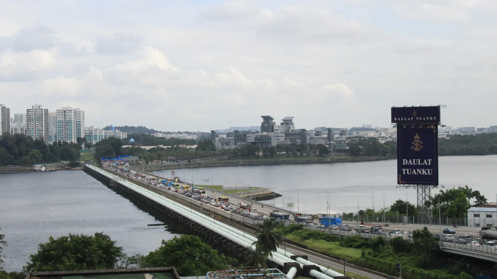 Heavy traffic on the Johor–Singapore Causeway seen from Johor Bahru, with Woodlands Checkpoint in the distance