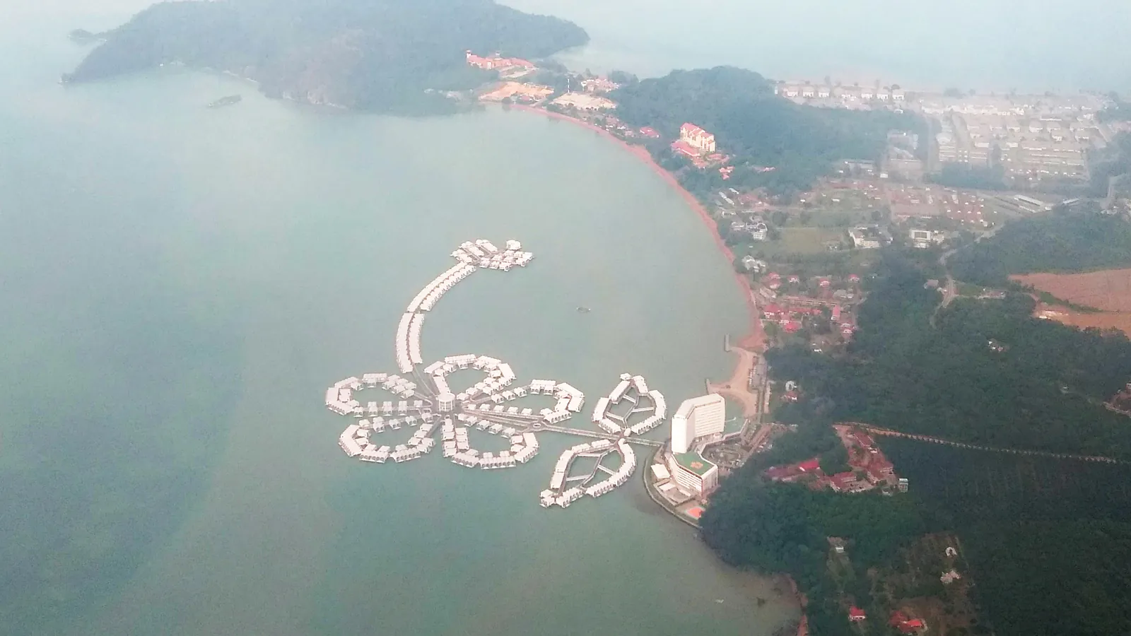 Aerial view of the hibiscus-shaped over-water villas of Lexis Hibiscus off the Port Dickson coast