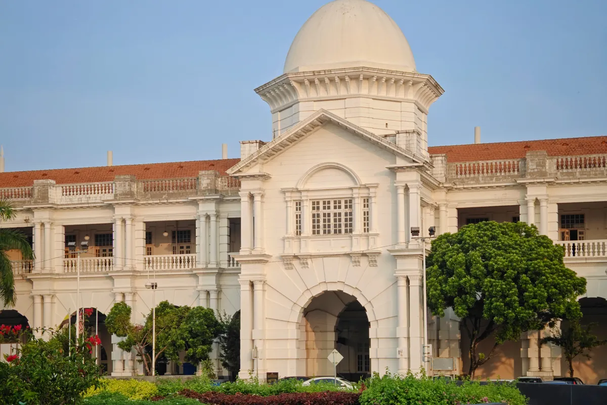 White colonial facade and dome of Ipoh railway station, Perak