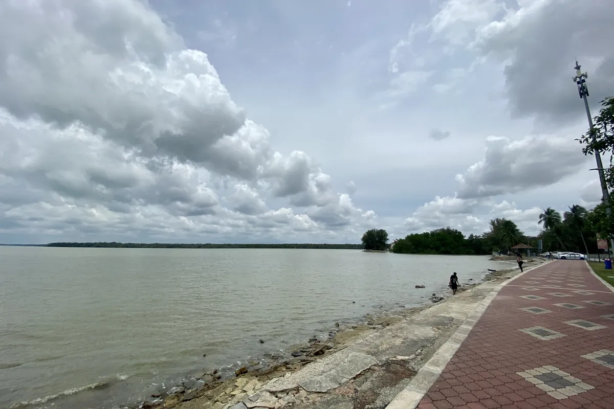 Riverside promenade at Tanjung Emas along the wide Muar River