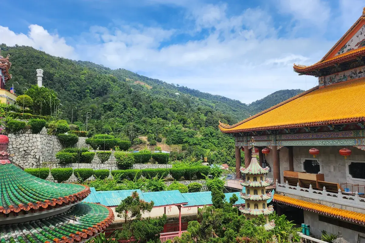 Kek Lok Si Temple roofs and pagoda on the green hills of Penang