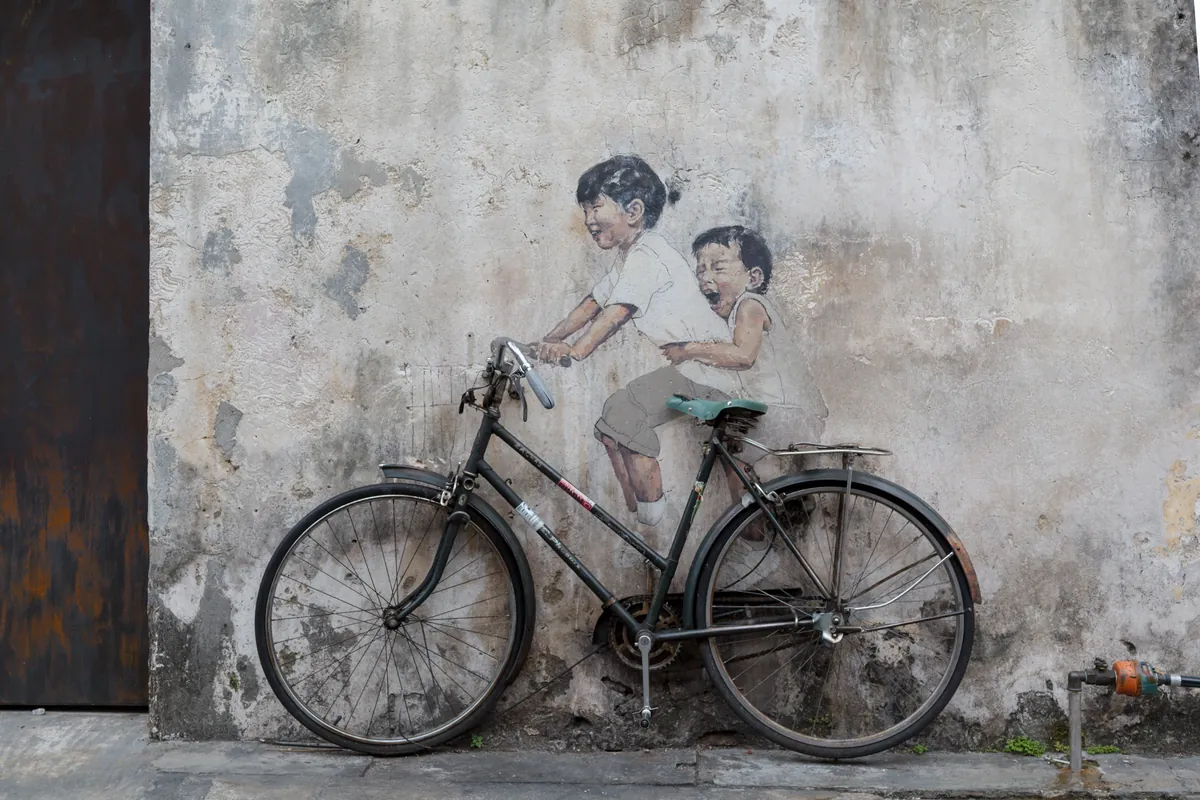 Children on a Bicycle street art mural in George Town, Penang