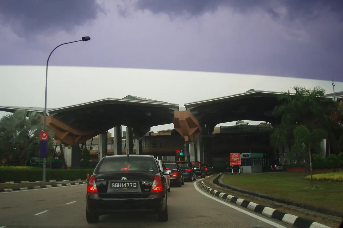 Cars queueing at the Sultan Abu Bakar Checkpoint, Tanjung Kupang